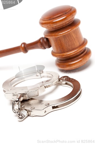 Image of Gavel and Handcuffs on White