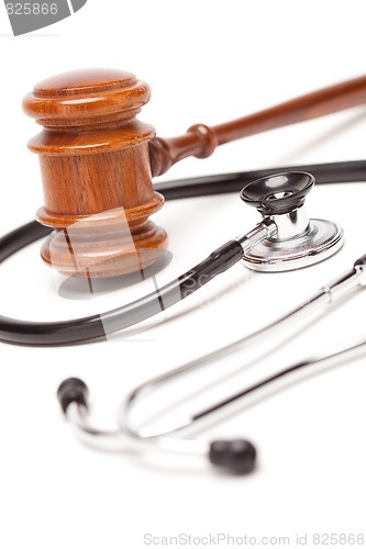 Image of Black Stethoscope and Gavel on White