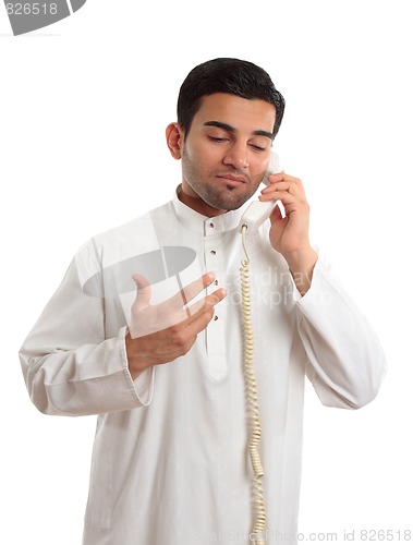 Image of Middle eastern arab businessman on the phone