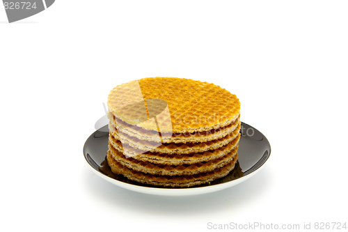 Image of cookies on plate isolated on white background