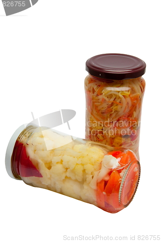 Image of Glass jars with marinated vegetables  isolated on the white back