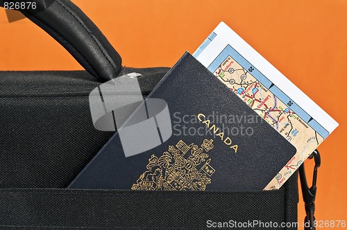 Image of Canadian passport and map.