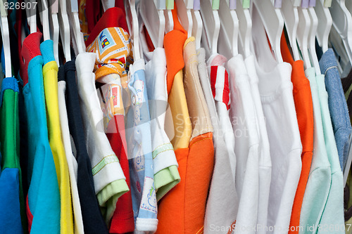 Image of Shelving with varicoloured cloth