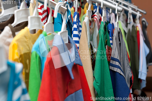 Image of Shelving with varicoloured cloth