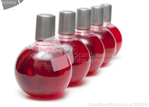 Image of Red make-up vials