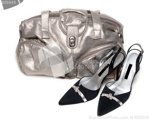 Image of Silvery leather bag and pair of the loafer