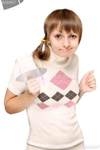 Image of Young beautiful girl makes faces