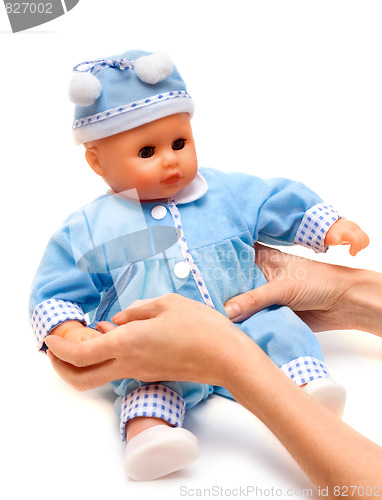 Image of Nursery doll in blue suit