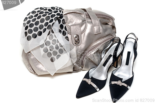 Image of Silvery leather bag and pair of the loafer