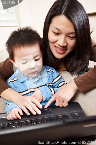 Image of Mother and son with laptop