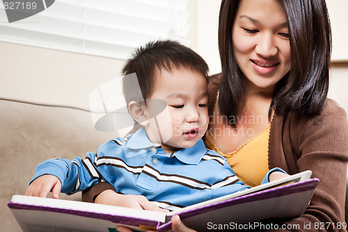 Image of Mother and son reading
