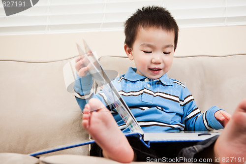 Image of Boy reading a book
