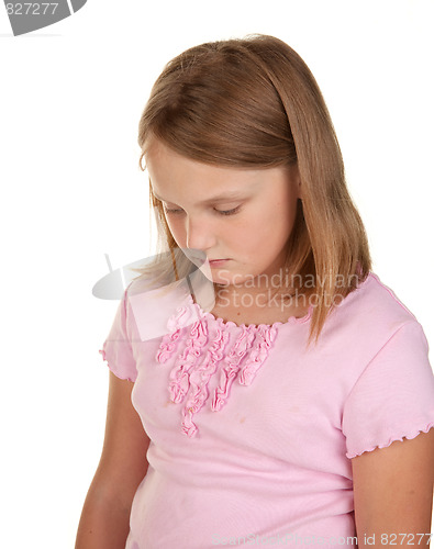 Image of unhappy girl on white