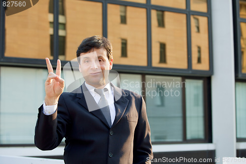 Image of Successful businessman outdoors