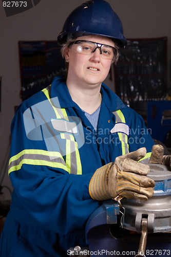 Image of Woman in male type job