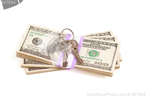 Image of House Keys on Stack of Money Isolated