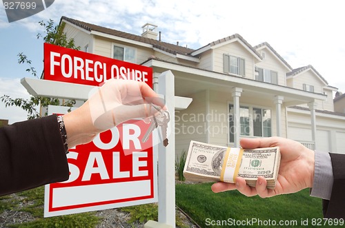 Image of Handing Over Cash For House Keys