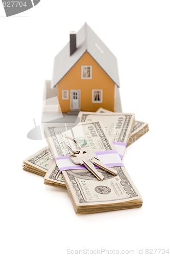 Image of Home and House Keys on Stack of Money Isolated