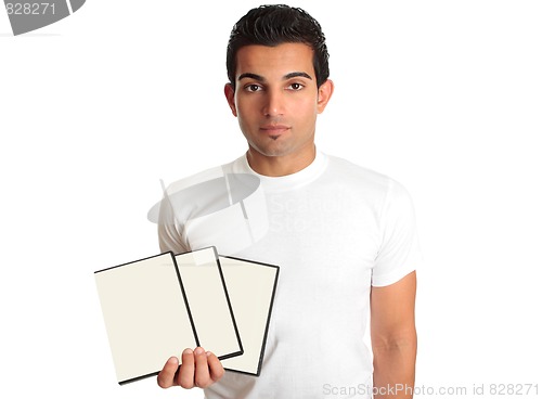 Image of Man holding set DVD movies or games in his hand