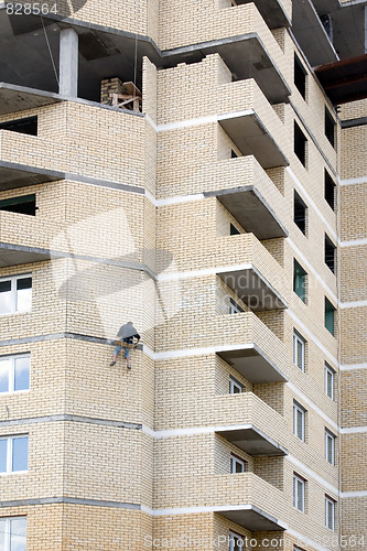 Image of Builder on a wall