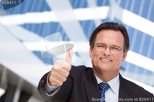 Image of Handsome, Confident Businessman with Thumbs Up