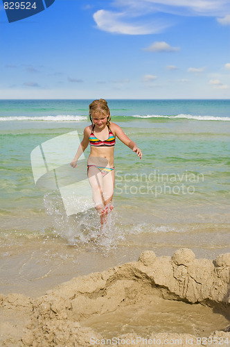 Image of cute girl at the beach