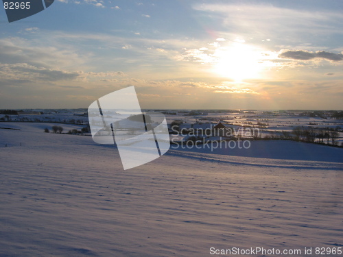 Image of Sunset in snowy landscape