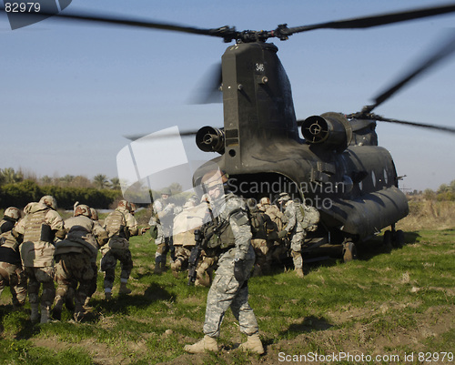 Image of Soldier boarding helicopter