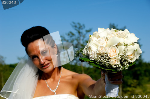 Image of Bride with flower bouquet