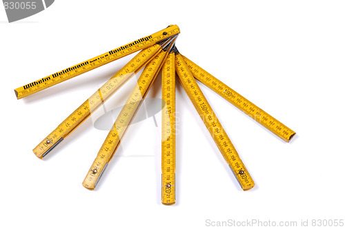 Image of Yellow wooden ruler.