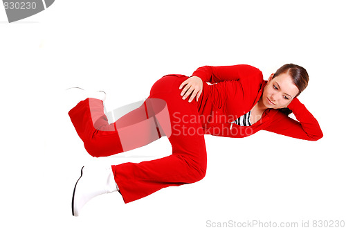 Image of Girl lying on floor and relaxing. 
