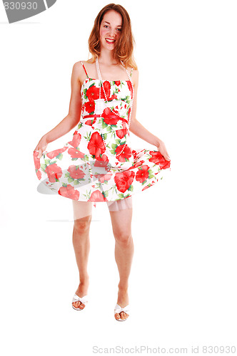 Image of Pretty girl in colorful dress.