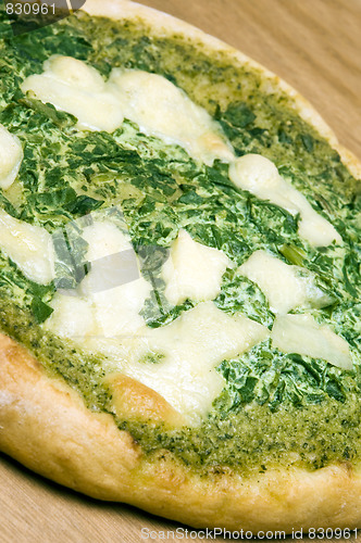 Image of organic pizza spinach basil pesto cheese