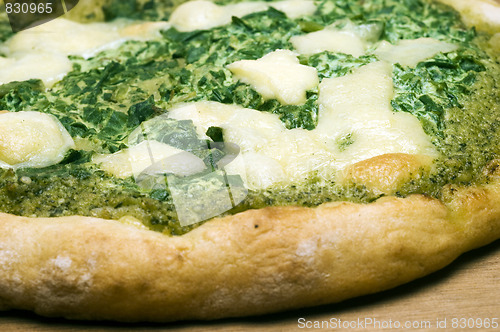 Image of organic pizza spinach basil pesto cheese