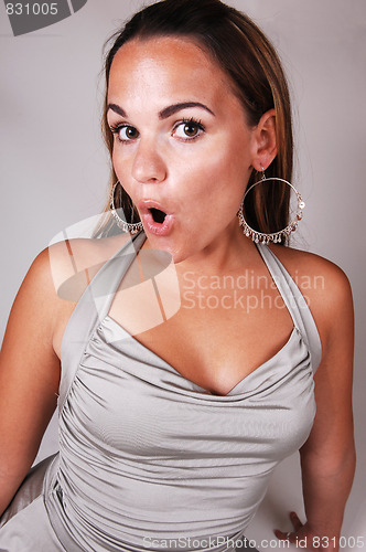 Image of Pretty girl in silver dress.