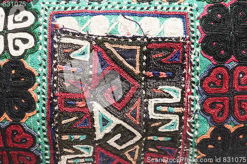 Image of detail macro of hand made knitted turkish kilm handbag pattern h