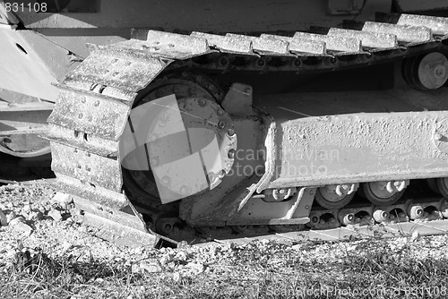Image of bulldozer tracks in black and white