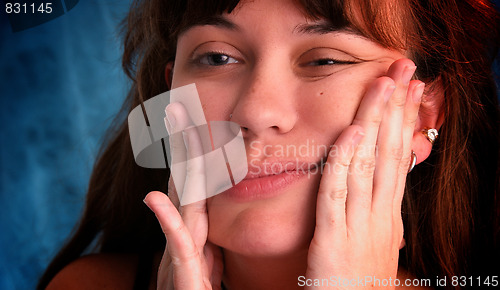 Image of beautiful woman distorting face