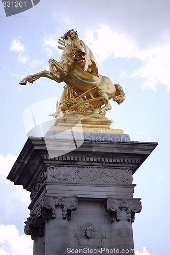 Image of golden parisian statue