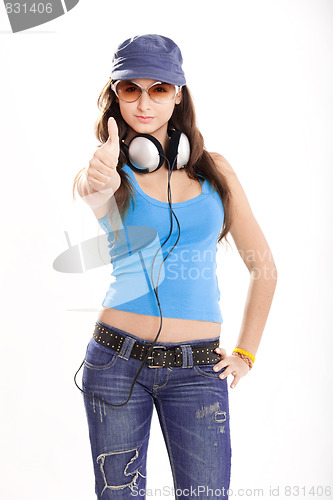 Image of Young girl listen music