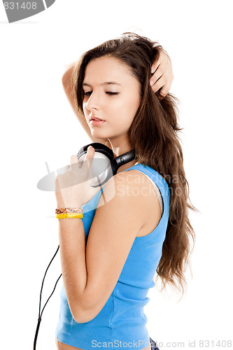 Image of Young girl listen music