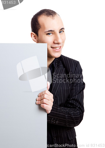 Image of Businessman showing something