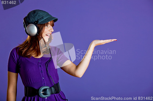Image of Beautiful woman listening music