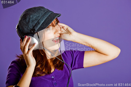 Image of Beautiful woman listening music