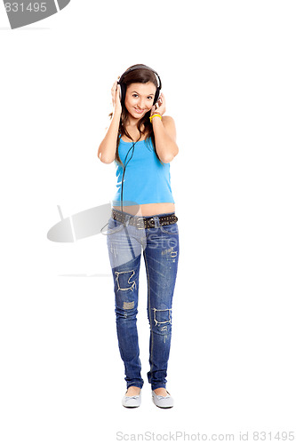 Image of Young girl listen music