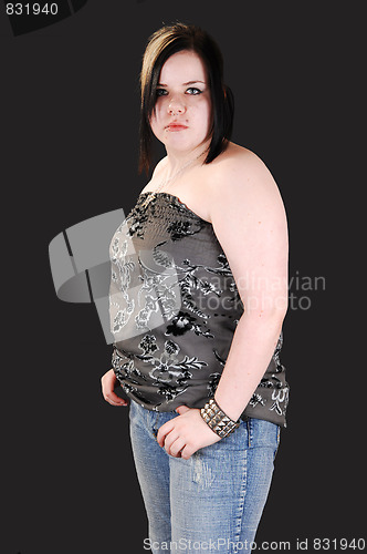 Image of Pretty girl in jeans and blouse.
