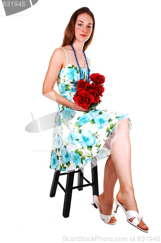 Image of Pretty girl in white and green dress.