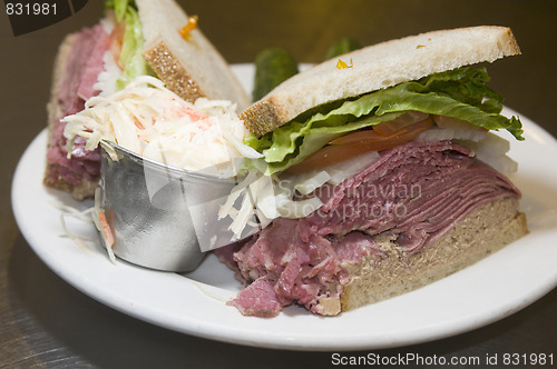 Image of deli combination sandwich corned  beef tongue chopped liver on j