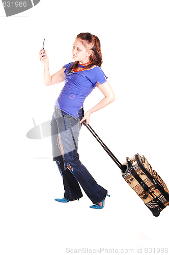 Image of Girl on a trip with cell phone.