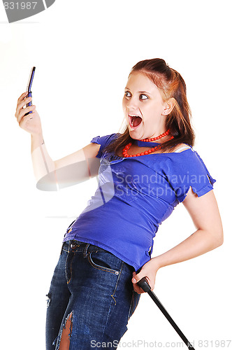 Image of Girl on a trip with cell phone.